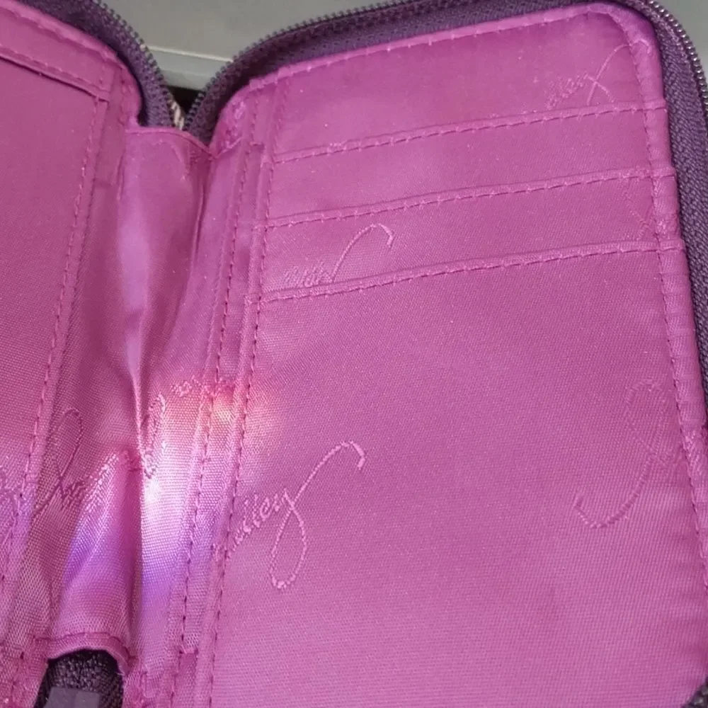 Vera Bradley  Cosmetic Case  and Wristlet.  They are both excellent condition.